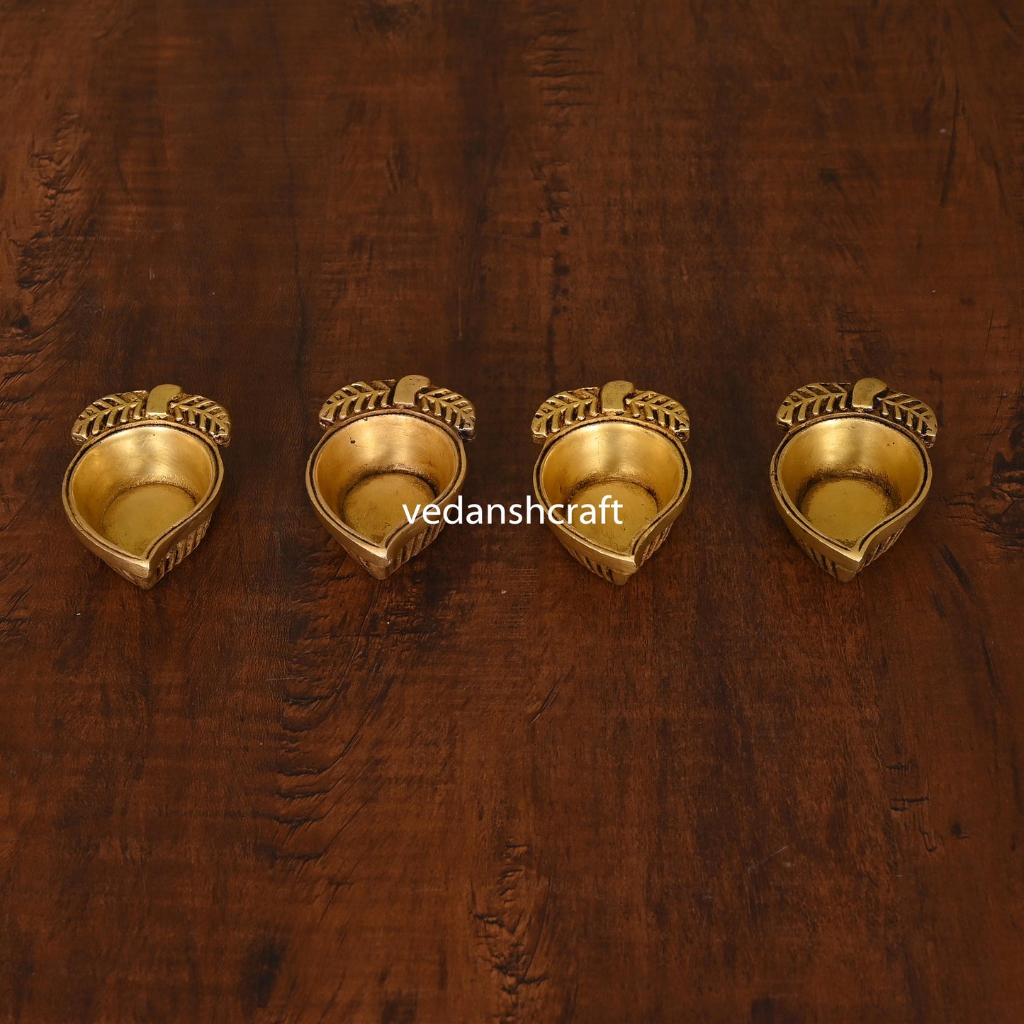 Brass Mango Shape Diya Set Of Four