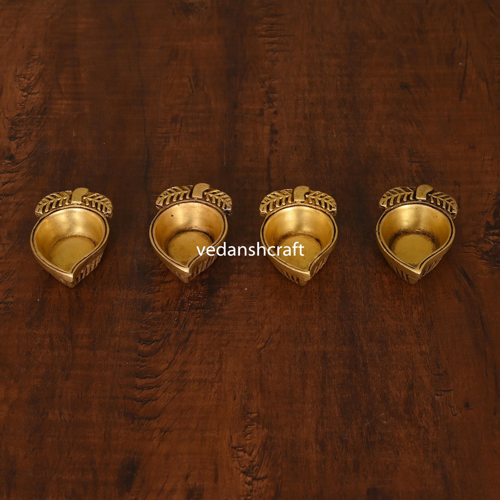 Brass Mango Shape Diya Set Of Four