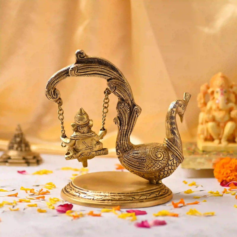 Brass Peacock Jhula with Ganesha Idol – Premium Decor (8 Inch)