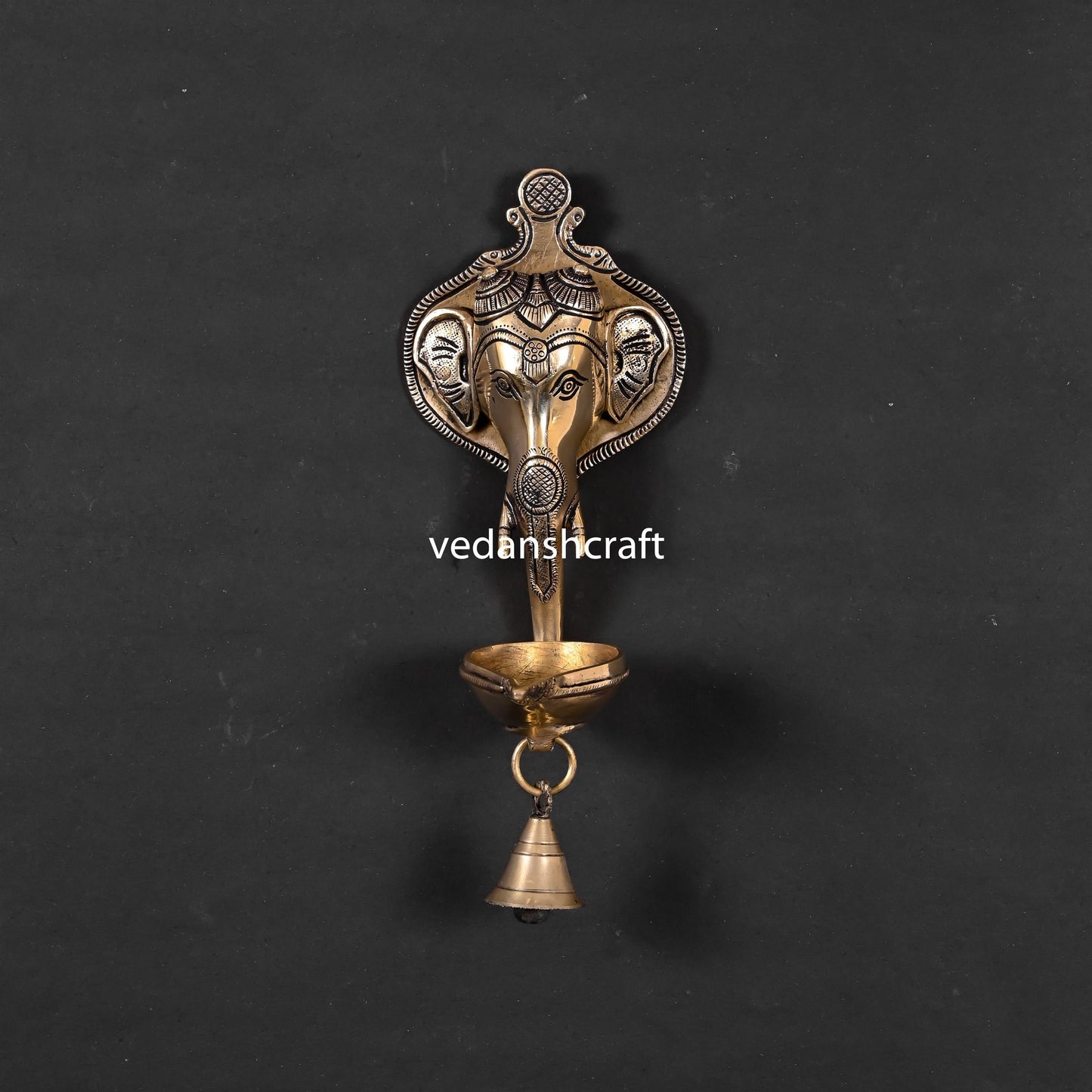 Brass Ganesha Face With Diya & Bell Wall Hanging (10 Inch)