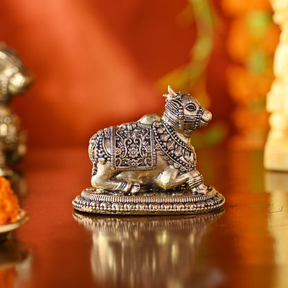 Brass Sitting Nandi Idol – Handcrafted Traditional Brass Decor (2 Inch)