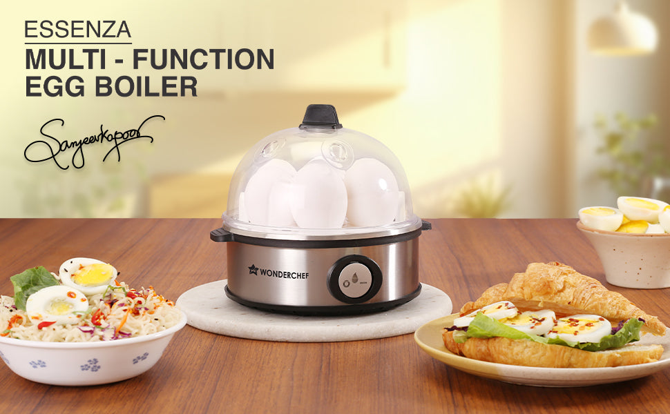 Essenza Instant Egg Boiler | 7 Poachers | 350 W | Stainless Steel Cool-touch Body | Auto Shut-off | Steaming Rack, Measuring Cup with Piercing Pin, Glass Lid with Steam Vent | 2-Year Warranty