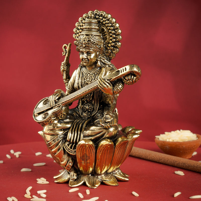 Pure Brass Goddess Saraswati ji Idol- Sitting on Lotus Flower