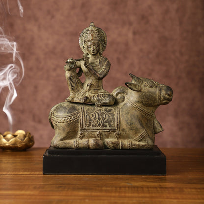 Indonesian Bronze Lord Krishna Sitting on Cow Sculpture | Height: 10 inch