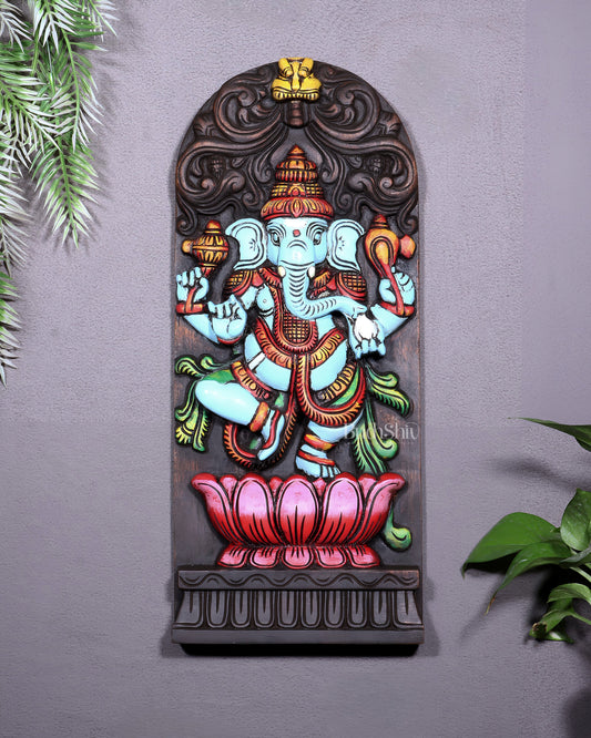 Wooden Ganesha Dancing on Lotus Motif – Vertical Wall Hanging Panel