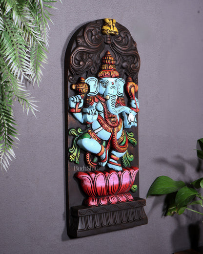 Wooden Ganesha Dancing on Lotus Motif – Vertical Wall Hanging Panel