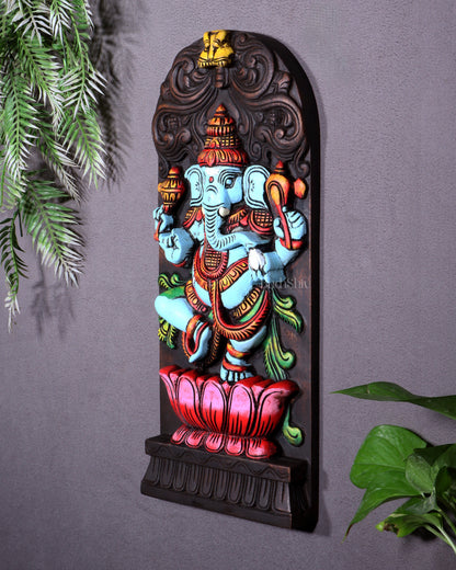 Wooden Ganesha Dancing on Lotus Motif – Vertical Wall Hanging Panel