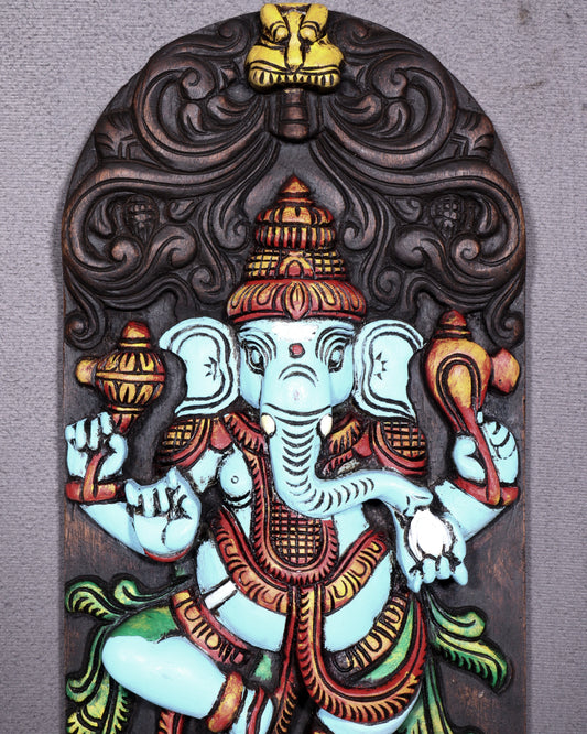 Wooden Ganesha Dancing on Lotus Motif – Vertical Wall Hanging Panel