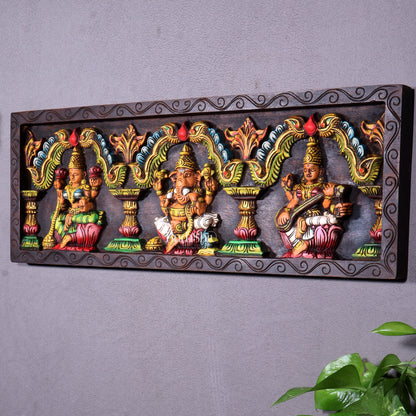 Hand-Painted Wooden Ganesha Lakshmi Saraswati Horizontal Wall Hanging – 24 Inch