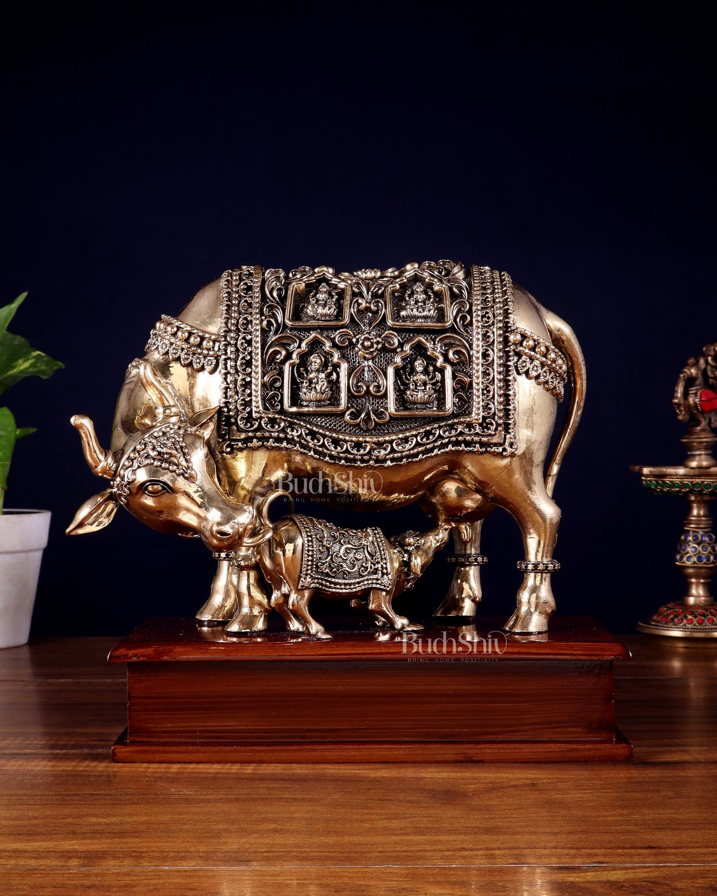 Brass Superfine Kamdhenu Cow with Calf with ashtalakshmi carvings on Wooden Base – 9.5 Inch