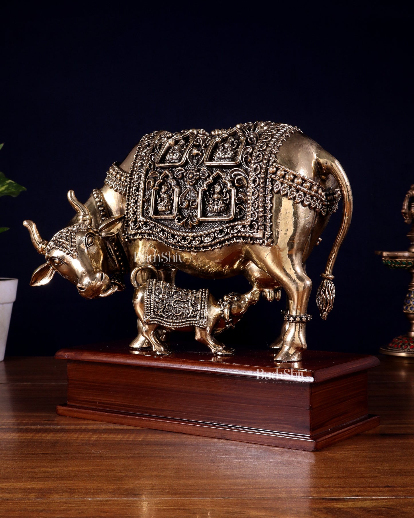 Brass Superfine Kamdhenu Cow with Calf with ashtalakshmi carvings on Wooden Base – 9.5 Inch
