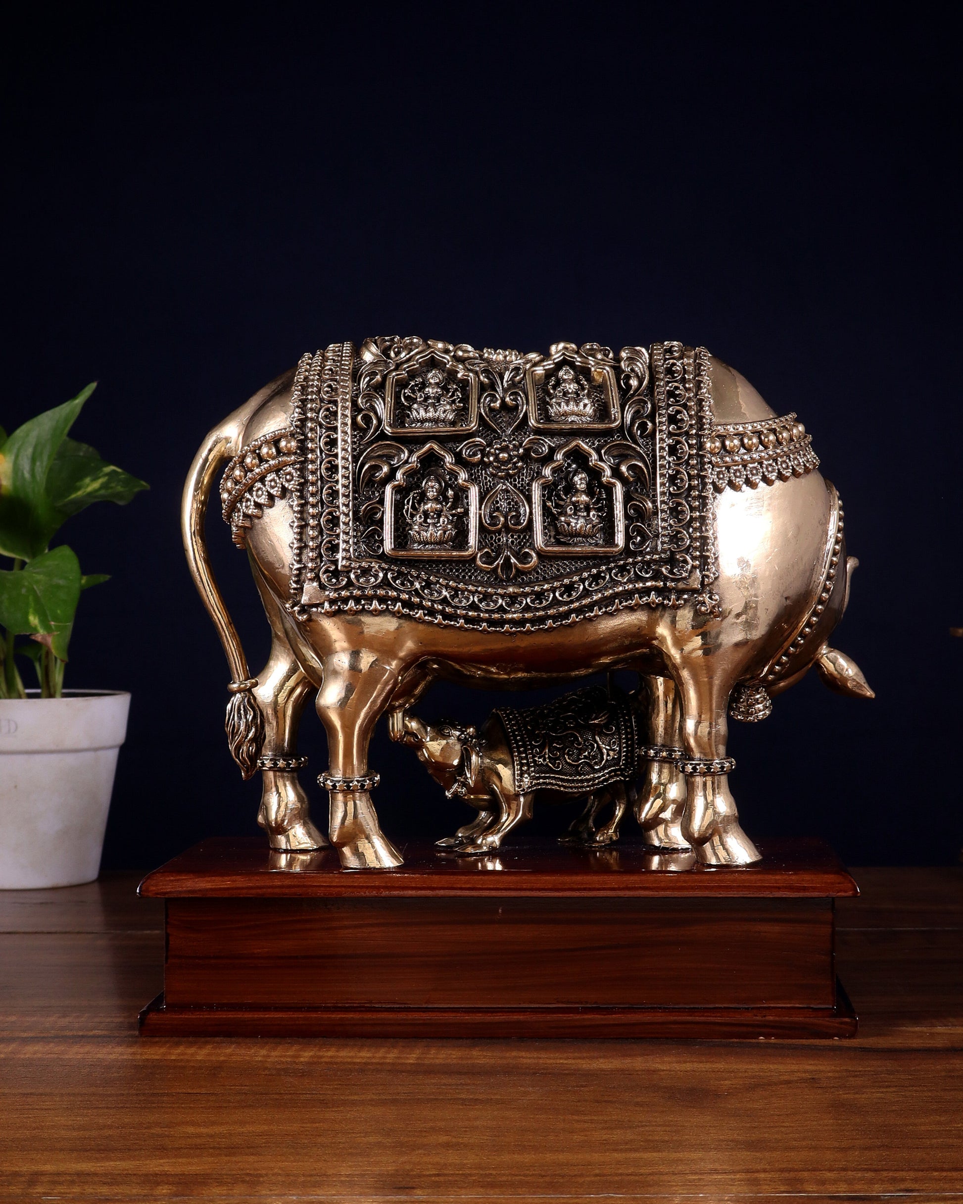 Brass Superfine Kamdhenu Cow with Calf with ashtalakshmi carvings on Wooden Base – 9.5 Inch