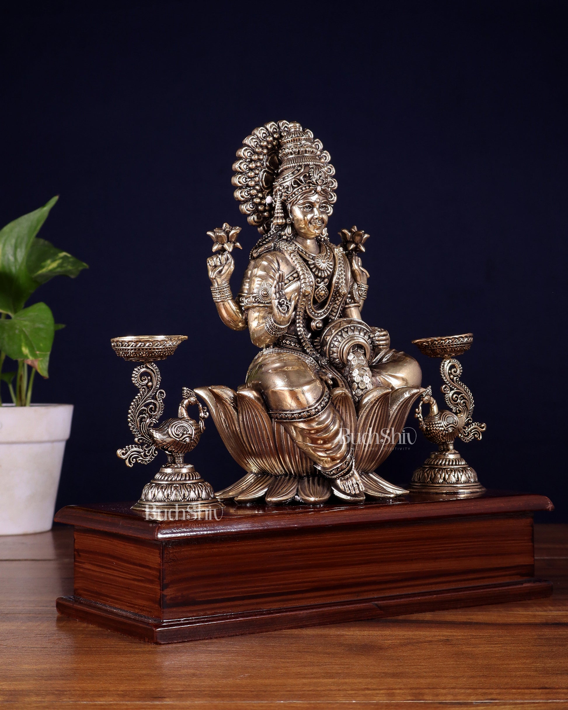 Brass Superfine Goddess Lakshmi Idol with Twin Peacock Lamps on Wooden Base – 9.5 Inch