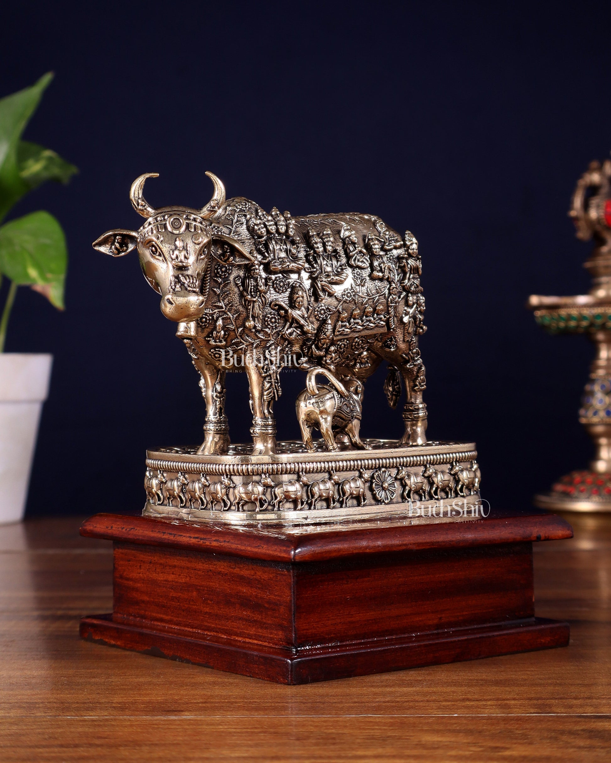 Brass Superfine Kamdhenu Cow with Calf – All Gods Engraved on Wooden Base (8.5 Inch)