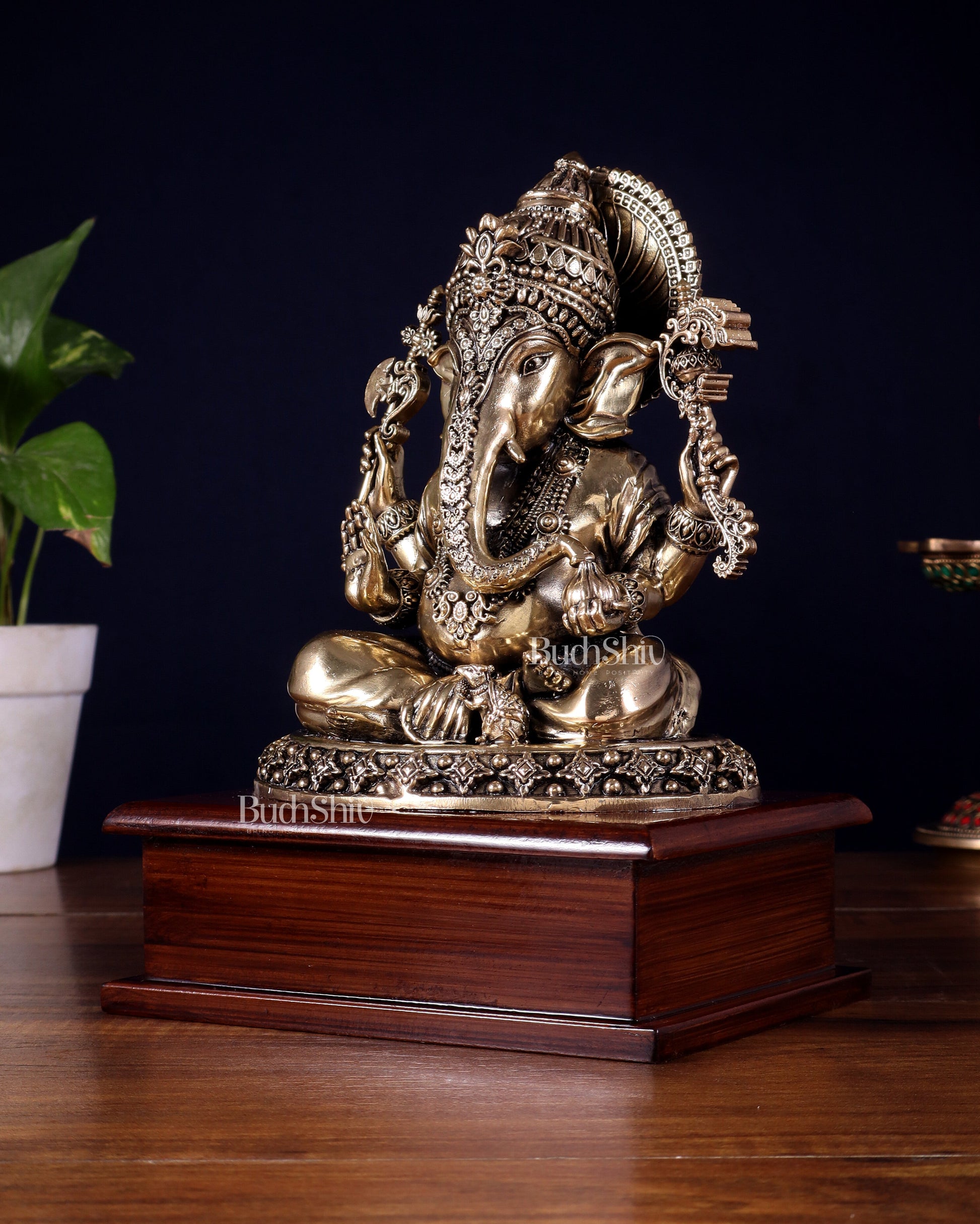 Brass Superfine Ganesha Idol – Intricate Design on Wooden Base (8.5 Inch)