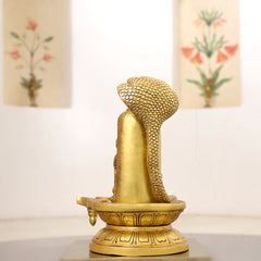 Brass Lord Shiva Mukhalingam with Naga Canopy Shivling Idol (12.5 Inch)