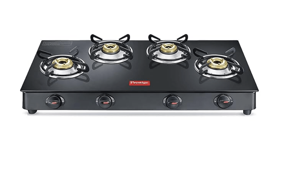 Prestige Magic plus Toughened Glass-Top(Long)4 Brass Burner LPG Gas Stove (GTMP-04L)| Black Spill Proof Design | Ergonomic Knob | Tri-Pin Burner