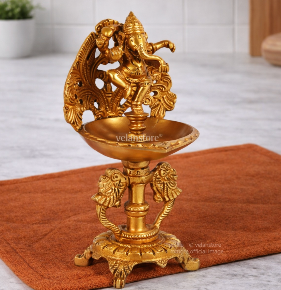 Brass engraved Dancing Ganesha diya with a stand peacock and floral design 9 inch