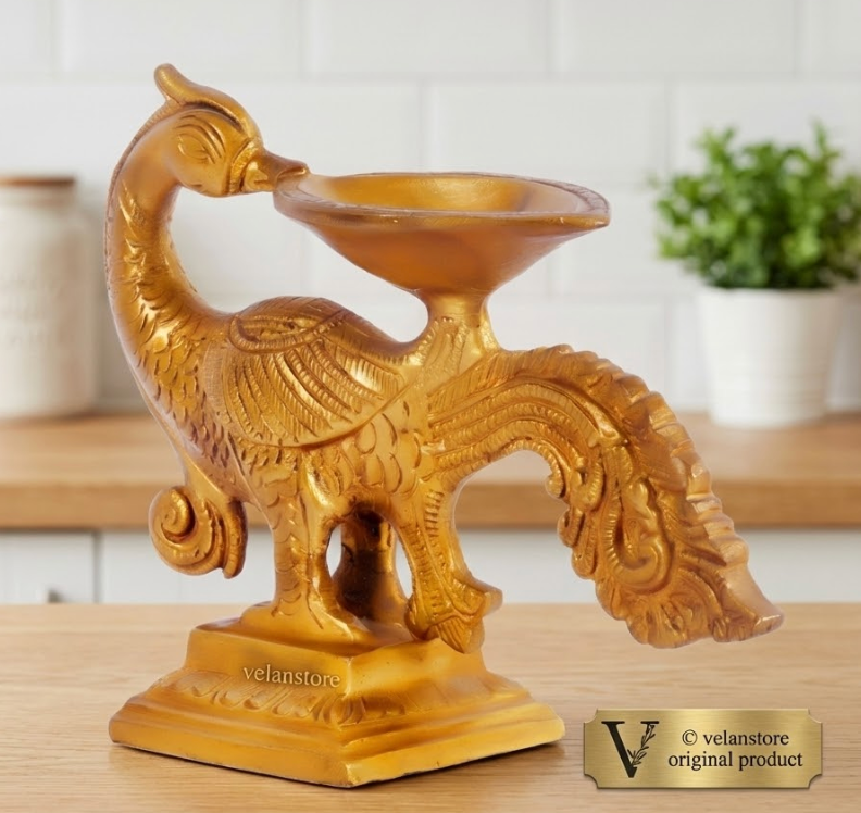 Peacock/annam bending brass diya