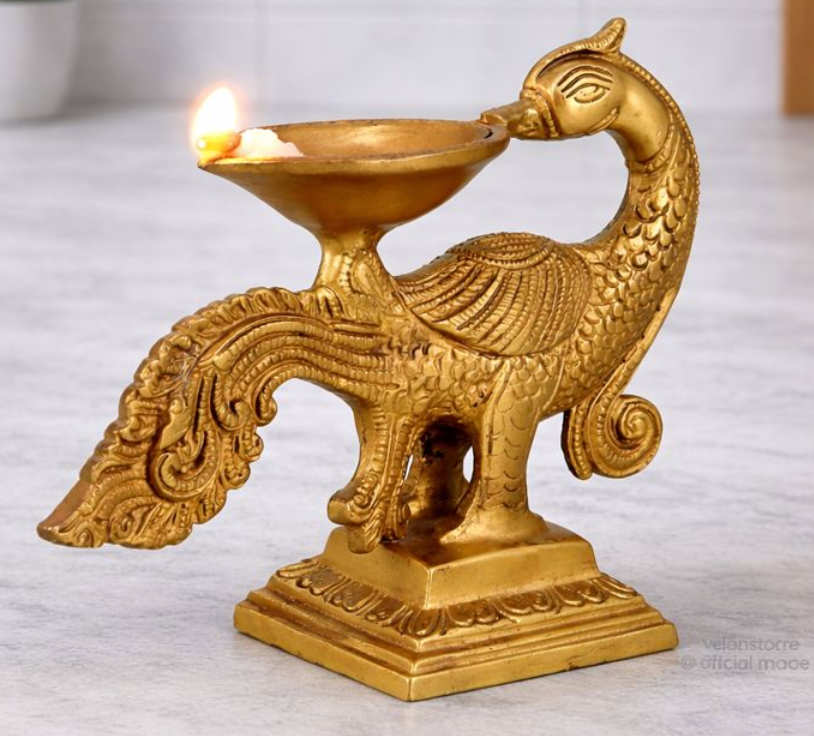 Peacock/annam bending brass diya