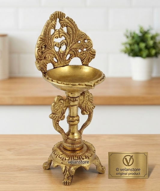 Brass engraved diya with a stand peacock and floral design 9 inch