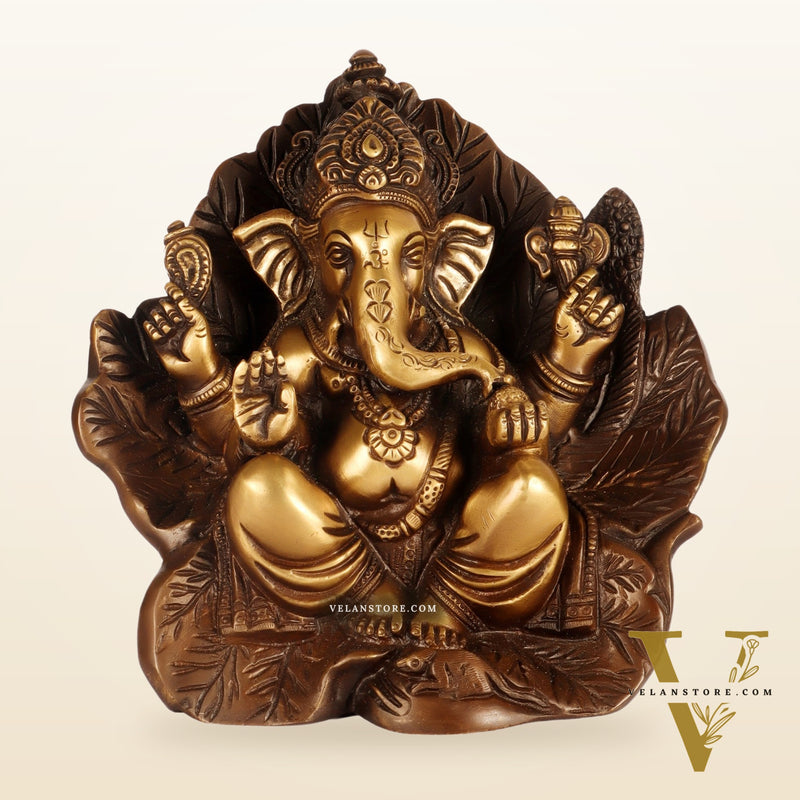 Beautifully Handcrafted Brass Ganapathi Statue Seated on Leaf Throne - 7" Height
