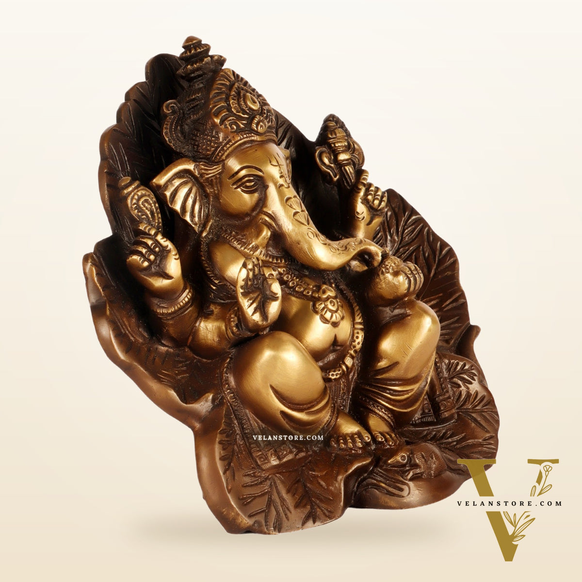 Beautifully Handcrafted Brass Ganapathi Statue Seated on Leaf Throne - 7" Height