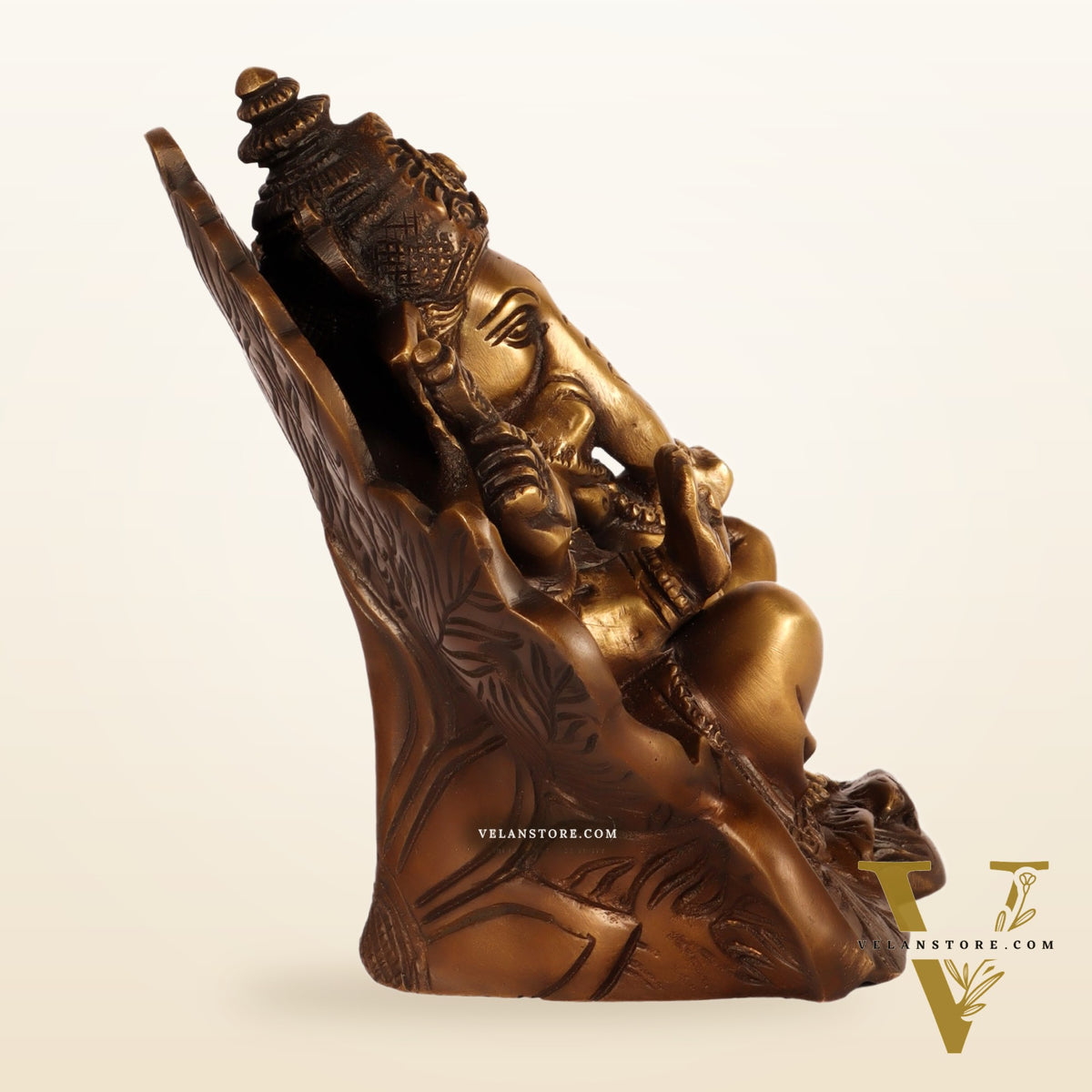 Beautifully Handcrafted Brass Ganapathi Statue Seated on Leaf Throne - 7" Height