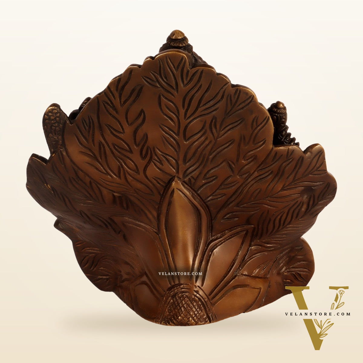 Beautifully Handcrafted Brass Ganapathi Statue Seated on Leaf Throne - 7" Height