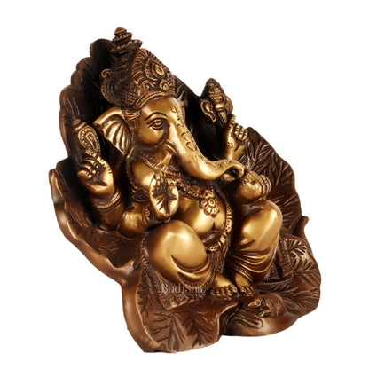 Beautifully Handcrafted Brass Ganapathi Statue Seated on Leaf Throne - 7" Height