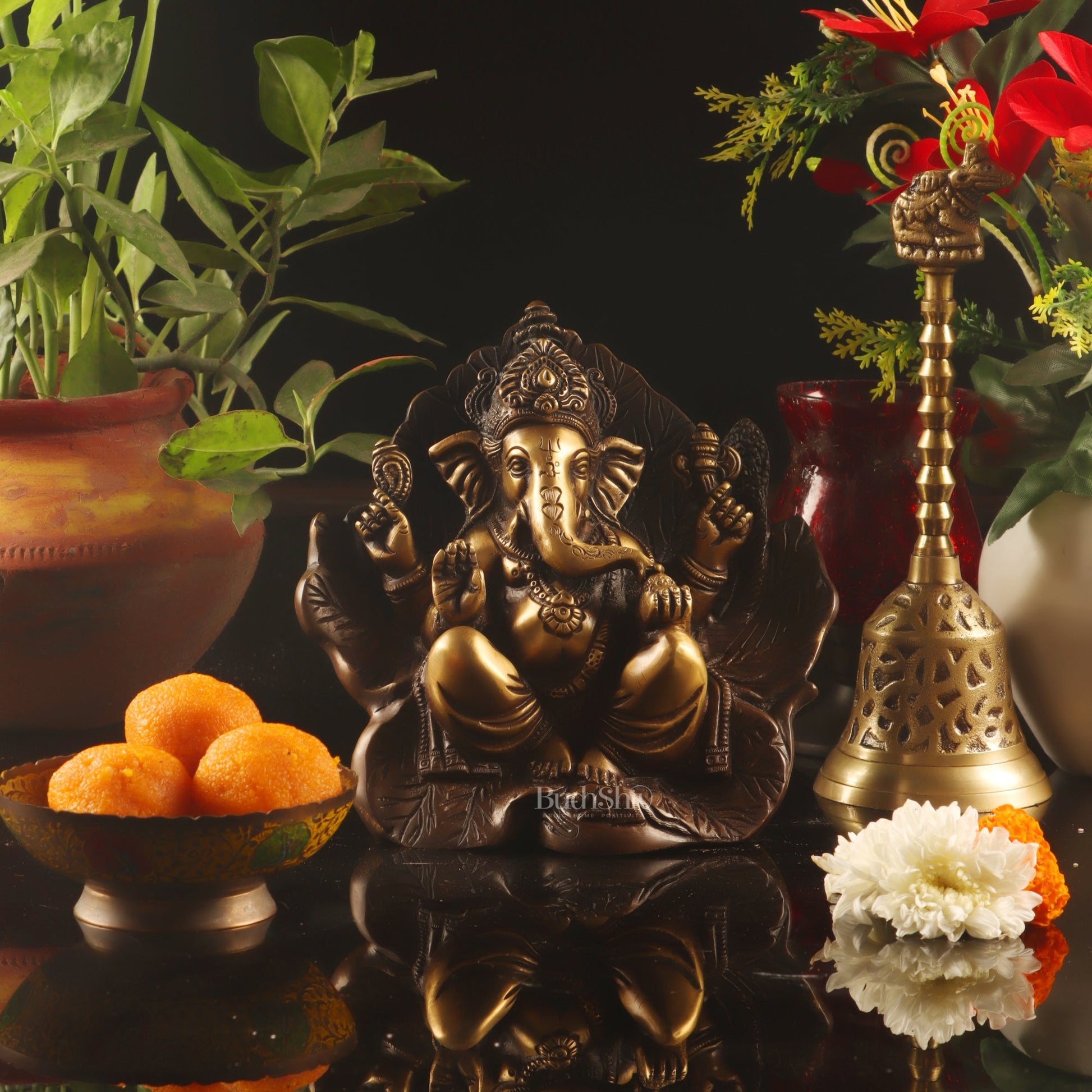 Beautifully Handcrafted Brass Ganapathi Statue Seated on Leaf Throne - 7" Height
