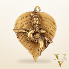 Brass Baby Krishna Baal Gopal Resting on a Leaf Hanging on Wooden Frame with Premium Fabric - 13" x 14"