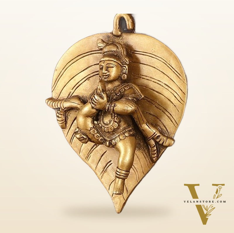 Brass Baby Krishna Baal Gopal Resting on a Leaf Hanging on Wooden Frame with Premium Fabric - 13" x 14"