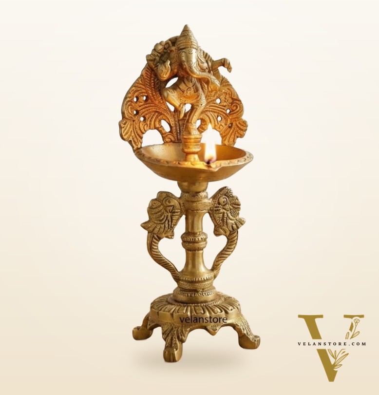 Brass engraved Dancing Ganesha diya with a stand peacock and floral design 9 inch