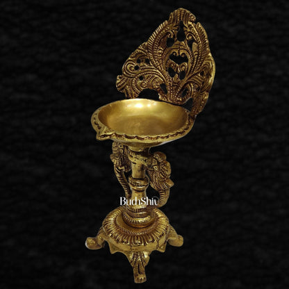 Brass engraved diya with a stand peacock and floral design 9 inch