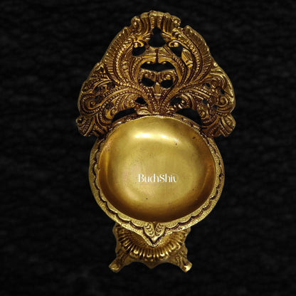 Brass engraved diya with a stand peacock and floral design 9 inch