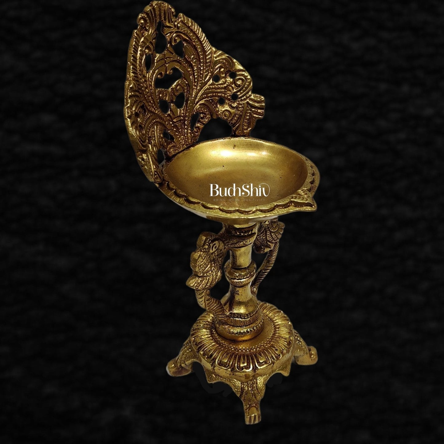 Brass engraved diya with a stand peacock and floral design 9 inch