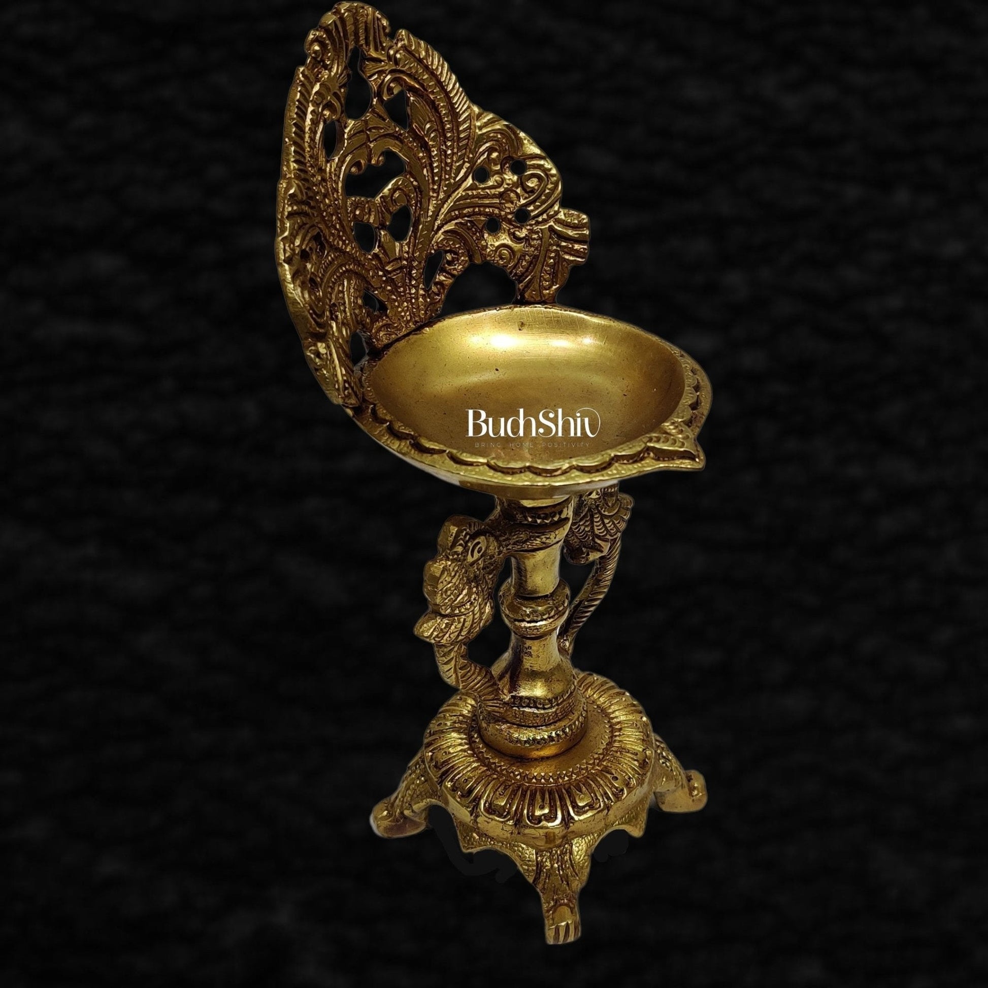 Brass engraved diya with a stand peacock and floral design 9 inch