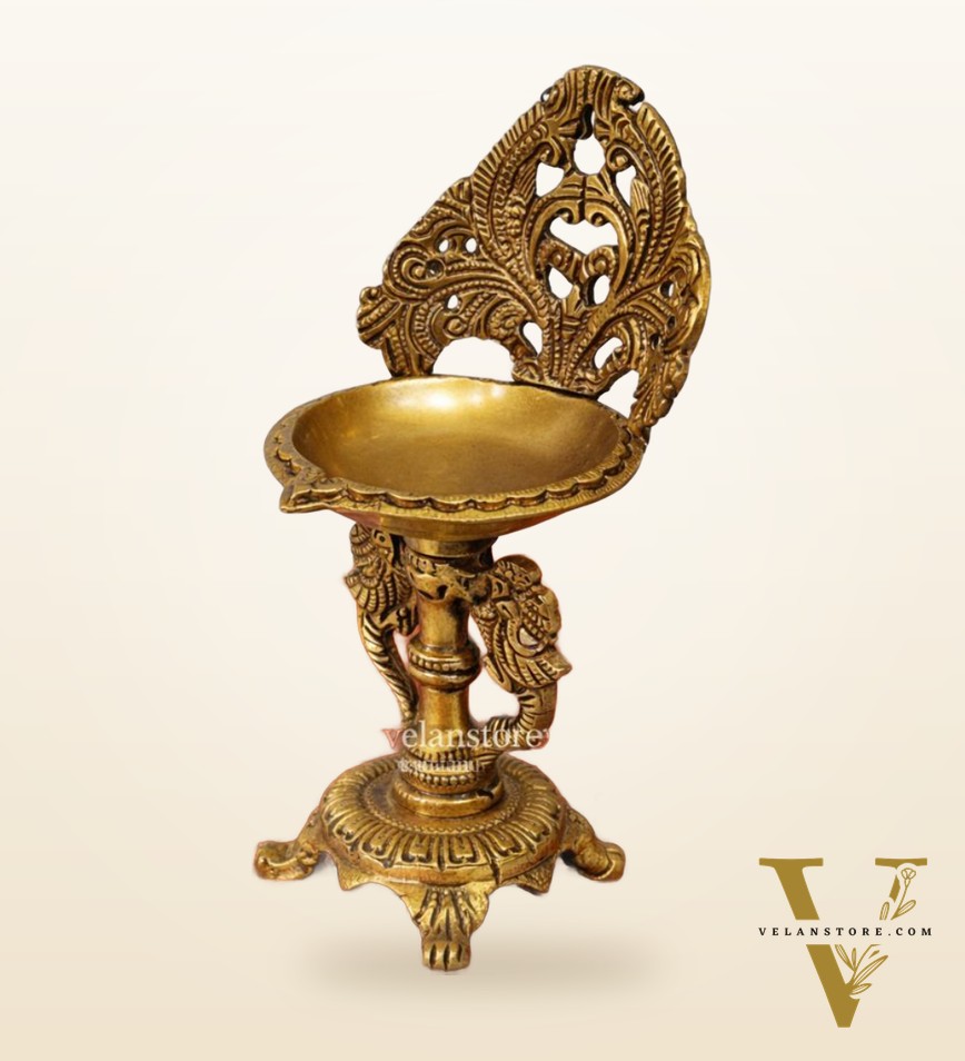 Brass engraved diya with a stand peacock and floral design 9 inch