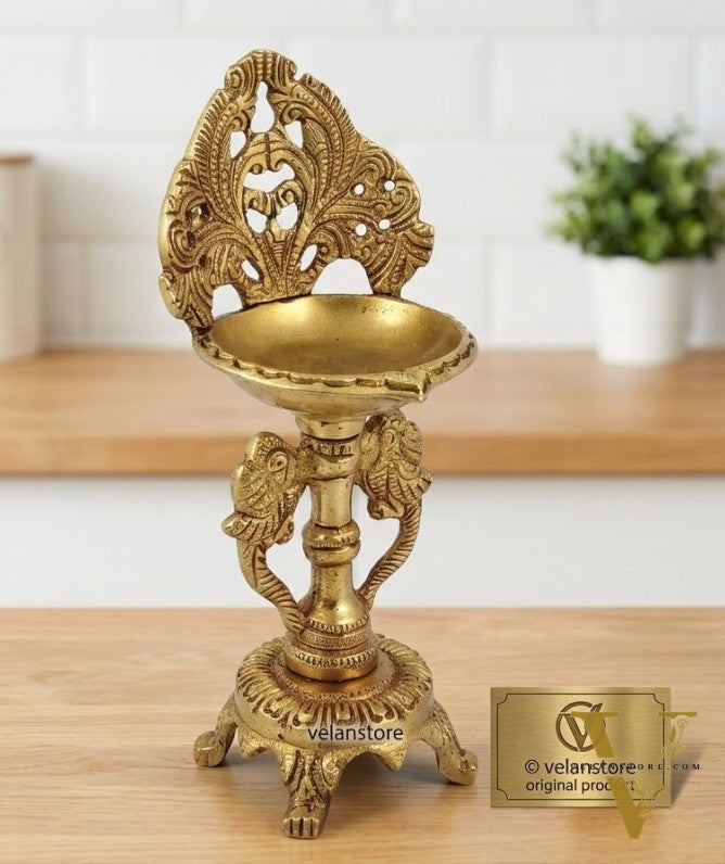 Brass engraved diya with a stand peacock and floral design 9 inch