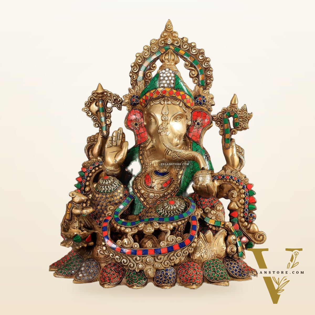 Brass Ganapati statue with sharp features - 16 inches