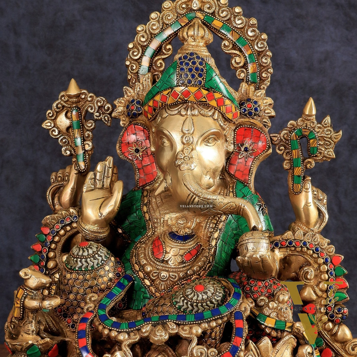 Brass Ganapati statue with sharp features - 16 inches