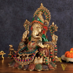 Brass Ganapati statue with sharp features - 16 inches