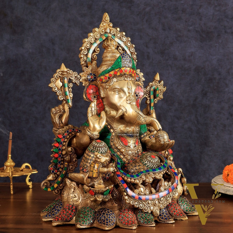 Brass Ganapati statue with sharp features - 16 inches