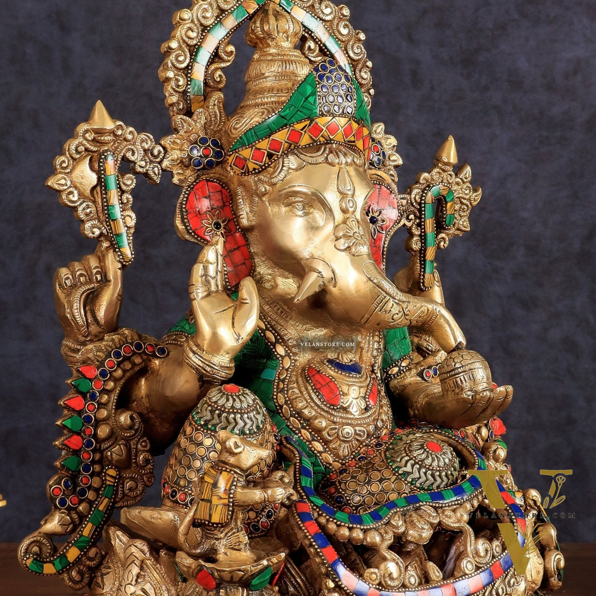 Brass Ganapati statue with sharp features - 16 inches