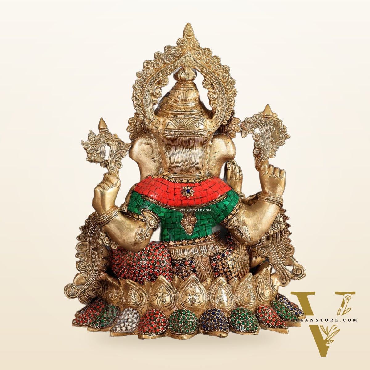Brass Ganapati statue with sharp features - 16 inches