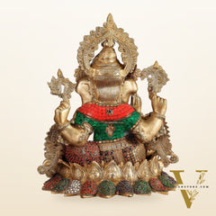 Brass Ganapati statue with sharp features - 16 inches