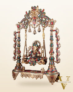 Brass Ganesha idol on large Swing jhoola - 26 inch floral stonework