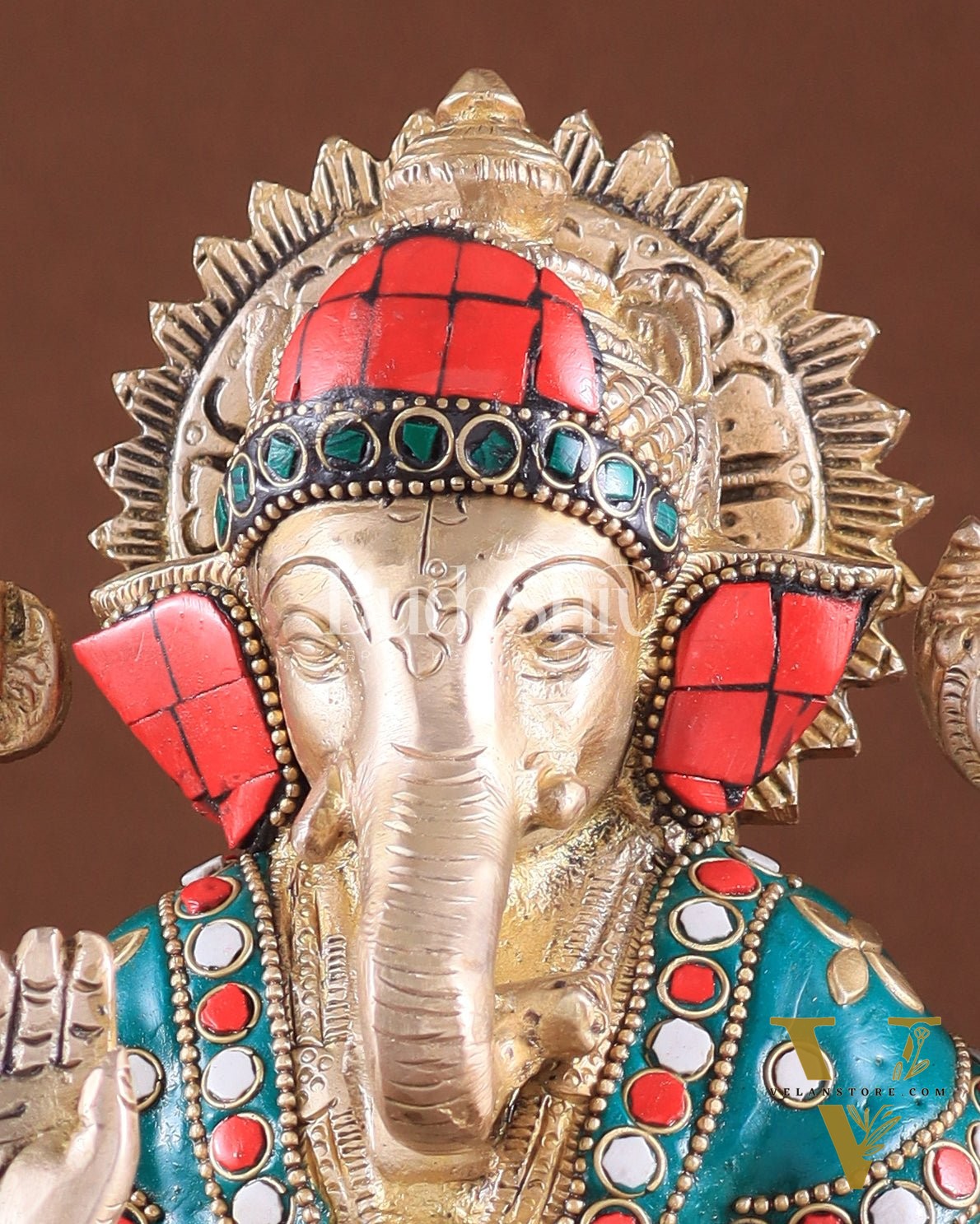 Brass Ganesha on a sofa embossed idol 10 inch