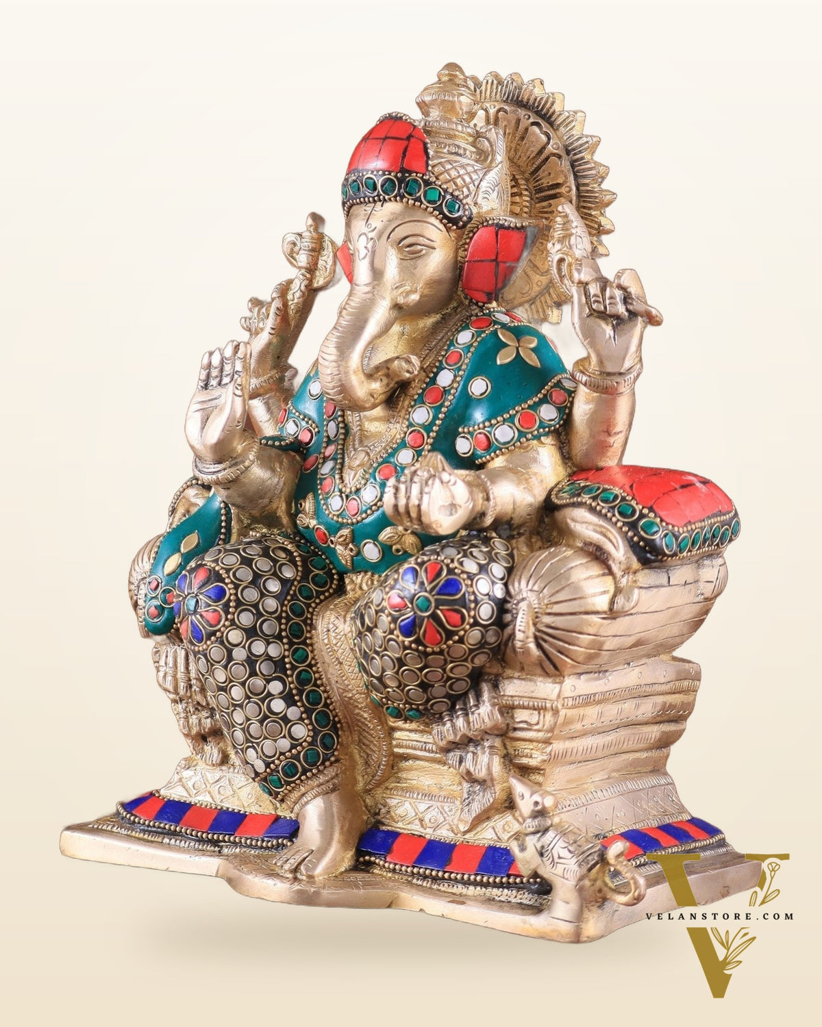 Brass Ganesha on a sofa embossed idol 10 inch